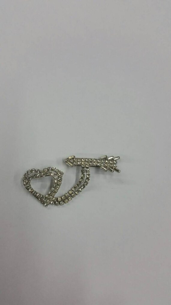 Rhinestone heart and arrow Cupid brooch