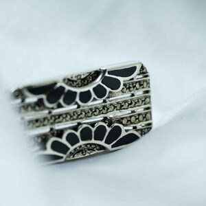 Vintage brooch with sterling silver, onyx and marcasite
