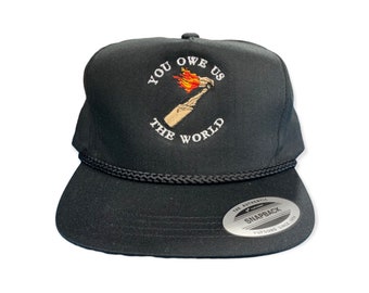 You Owe Us The World-Embroidered-Snapback-Black Hat