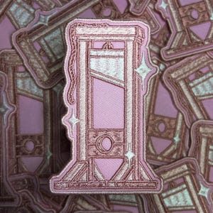 Pink-or Purple-Starburst-Guillotine-Artist Made-Embroidered-Machined Embroidered-Iron On-Sew On-Patch