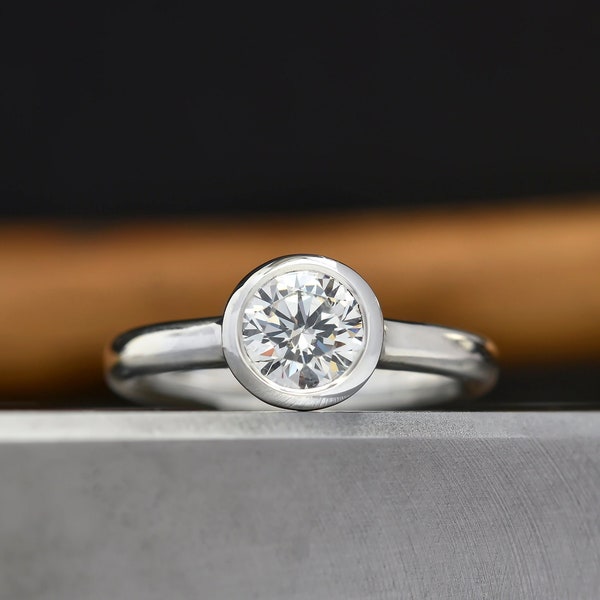 Moissanite engagement ring in silver, 1ct Charles and colvard Forever one Moissanite, bezel solitaire ring