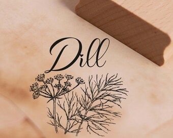May include: A wooden stamp with the word "Dill" and a black and white illustration of dill sprigs.