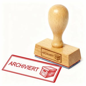 May include: A wooden stamp with the word "ARCHIVIERT" and a box graphic. The stamp is pressed onto a white surface, leaving a red rectangular imprint with the same text and a box illustration. The stamp handle is light brown.