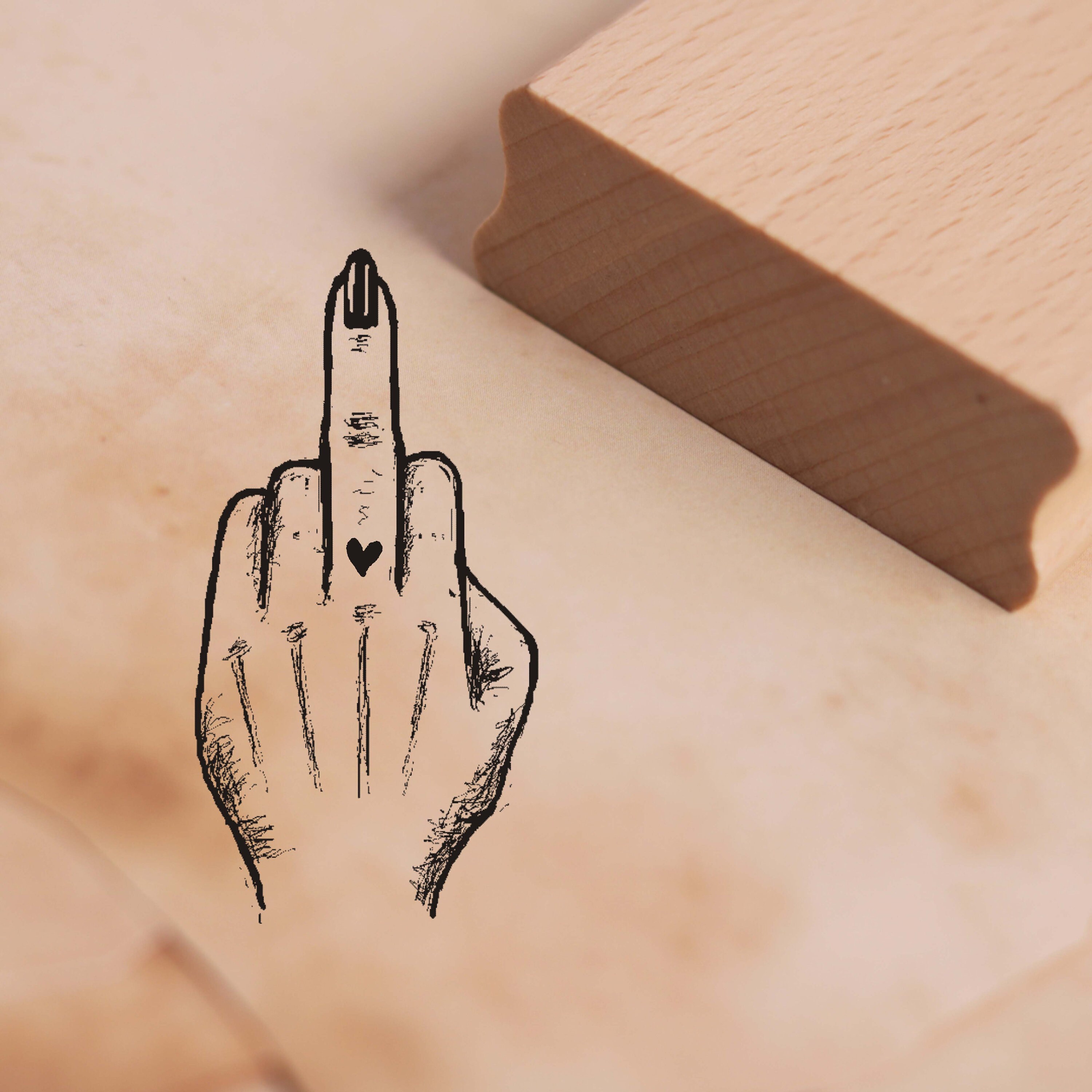 Flipping off tattoo