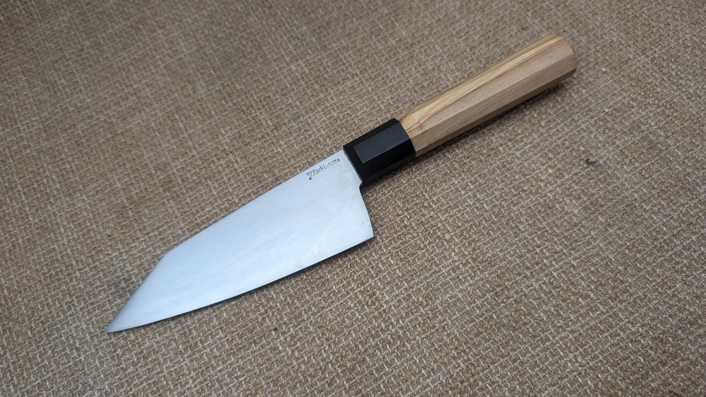 AEB-l stainless kitchen knife with olive wood Wa handle