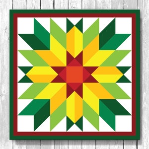 May include: A framed geometric starburst design in shades of yellow, green, and red. The starburst is centered on a white background, framed by a red and green border. The design is reminiscent of a quilt block.