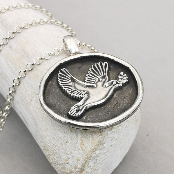 Peace dove necklace, pendant with dove, customizable with engraving on the back, handmade from recycled silver, slow fashion