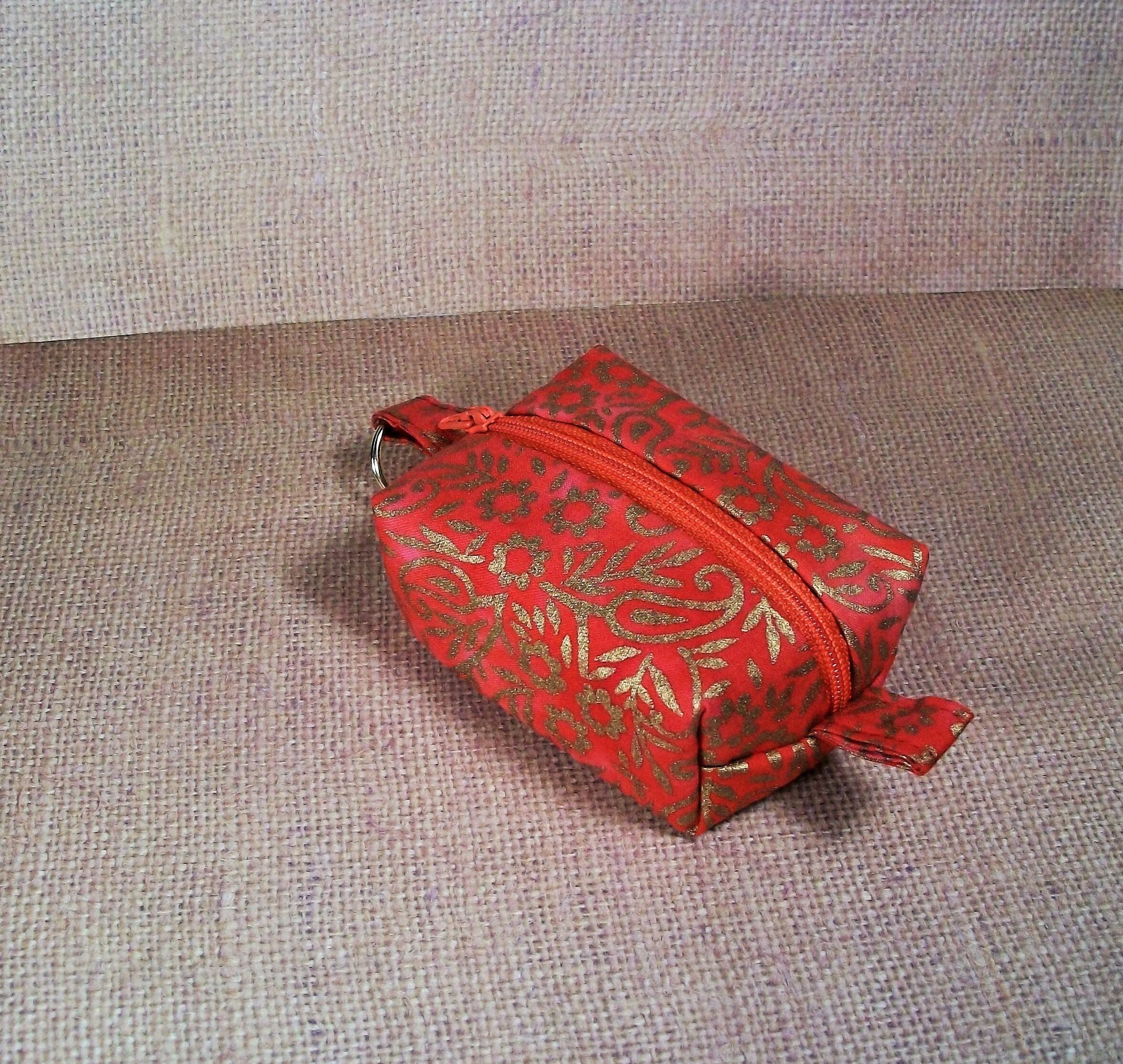 Small Keychain Pouch, With Zipper Top, Orangey Red Batik