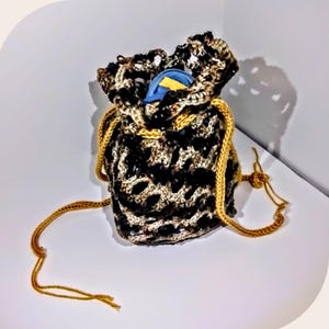 Patroon, gehaakt tasje met trekkoord in honingraatmotief