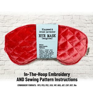 May include: A red quilted velvet eye mask with a light blue paper band featuring the text Flaxseed & Dried Lavender EYE MASK (weighted). Relax. Rejuvenate. Restore. Enjoy a deeper more restful sleep as the weighted mask applies gentle, even pressure.