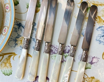 Antique dinner knife set with sterling silver floral emboss ferrules and mother of pearl handles // dinner knives // American Cutlery Co.