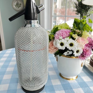 Vintage ACC Czech crystal soda bottle with mesh exterior // vintage barware // co2 soda bottle // midcentury bar cart accessory