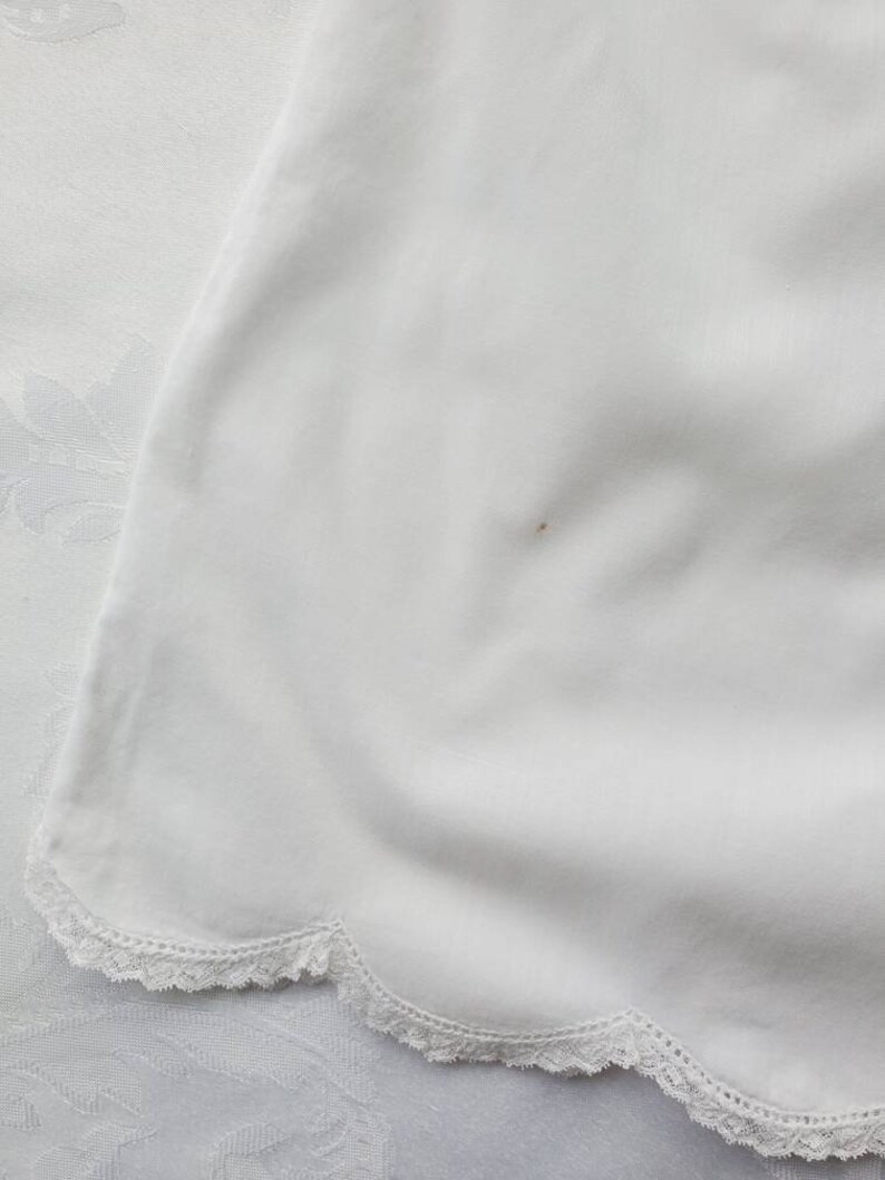 Vintage hand made baby dress 1950s 0 to 6 months hand smocked and embroidered summer baby dress lace trim scallop hem
