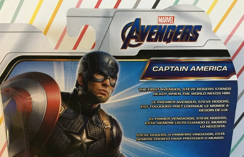 May include: A Captain America action figure from the Marvel Avengers series. The figure is wearing a blue and red costume with a star on the chest. The packaging features the Marvel Avengers logo and the text "Captain America". The text "The First Avenger, Steve Rogers stands ready when the world needs him." is also included on the packaging.
