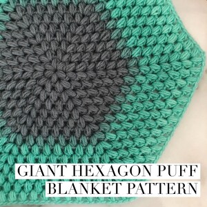 May include: A close-up of a crochet blanket pattern featuring a large hexagon made with a puff stitch. The hexagon is made with two colors of yarn, a dark gray and a light teal.
