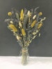 Small grey,  mustard yellow, and natural dried flower arrangements. Dried bunny tails 