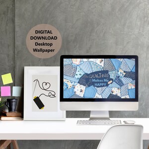 May include: A desktop computer with a blue and white patchwork quilt design wallpaper. The wallpaper features the text "QUILTING Makes Me HAPPY".