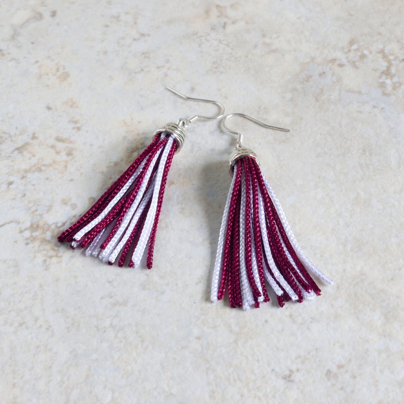 maroon and white tassel earrings
