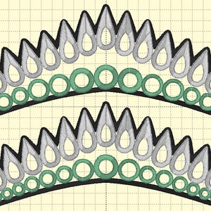 May include: Two black and white crowns with green circles around the bottom. The crowns are made of felt and have a pointed shape.