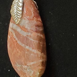 Ground and polished striped stone....