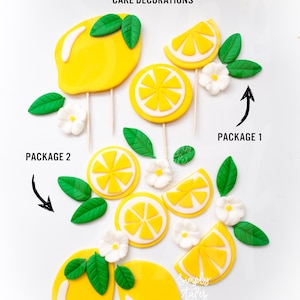 May include: Two packages of yellow fondant lemon cake decorations. Package 1 includes two whole lemons, two lemon slices, and two white flowers. Package 2 includes two whole lemons, four lemon slices, and four white flowers.