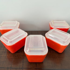Large set of Pyrex refrigerator containers, orange/red Pyrex small containers circa 1060’s kitchen