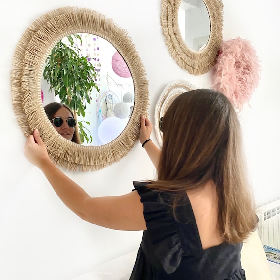 12 fotos e ideas geniales para decorar paredes con espejos redondos
