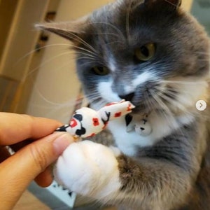 Toss Knot Catnip Toys - Upcycled materials stuffed with our all-natural homegrown catnip, guaranteed fun!