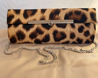 Leopard print clutch bag