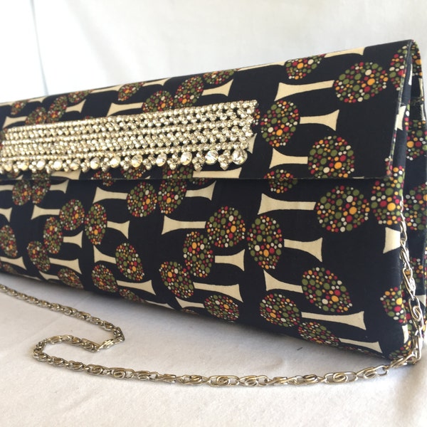 Elegant hand made printed Clutch bag made from cotton fabric, with diamonte details, detachable chrome chain, small inside pocket,