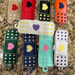 Bandage Holder Key Ring