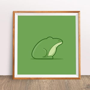 May include: A framed illustration of a green frog sitting on a green background. The frog is drawn in a simple, cartoon style.