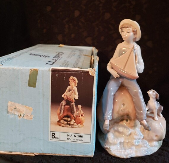 Lladro SEA FEVER, #5166, Boy With Sailboat, 160 USD, Boy at Ocean