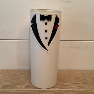 White groom you can get a red flower or white flower on lapel