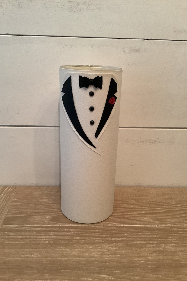 White groom you can get a red flower or white flower on lapel