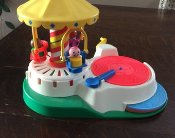 Vintage Fisher Price Little People Play a Tune Carousel
