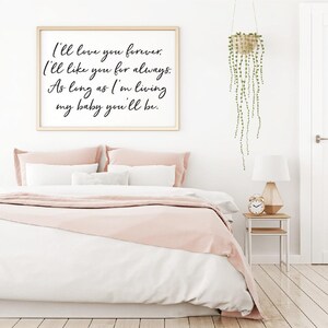 May include: A framed print with a white background and black text that reads "I'll love you forever. I'll like you for always. As long as I'm living my baby you'll be."
