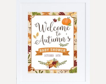 Könnte beinhalten: Ein weißes Schild mit braunem Rand und Herbstmotiven. Das Schild lautet "Willkommen zu Autumn's Baby Shower" und "18. Oktober".