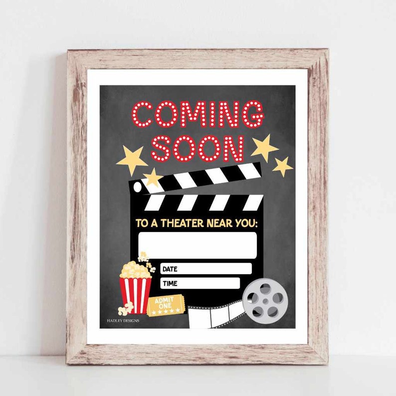May include: A black and white chalkboard with the text "COMING SOON" in red letters with white polka dots. The text is surrounded by yellow stars. Below the text is a black and white clapperboard with the text "TO A THEATER NEAR YOU:" in black letters. Below the clapperboard is a red and white striped bucket with popcorn, a black and white film reel, and a movie ticket with the text "ADMIT ONE" in black letters.
