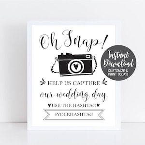 Oh Snap Help us capture on our wedding day, use the hashtag, with hashtag provided, photo of a camera, black and white colors, cute modern decor for wedding to add a social media touch, social media wedding, Supplies for wedding, wedding supplies