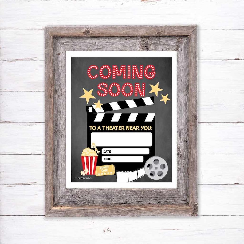 May include: A chalkboard sign with the text "Coming Soon" in red and white letters. The sign has a black and white movie clapperboard, a popcorn bucket, a movie ticket, and a film reel. The text "To a Theater Near You" is below the clapperboard. There are blank lines for the date and time.