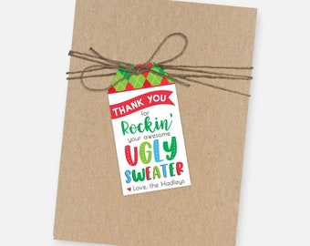 May include: A white gift tag with a red, green, and white plaid pattern at the top. The tag says "Thank you for rockin' your awesome ugly sweater. Love, the Hadleys".