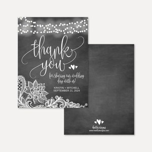May include: Black and white wedding thank you card with a lace design and string lights. The text reads "thank you for sharing our wedding day with us! Kristin + Mitchell September 21, 2024".