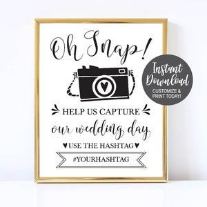 Oh Snap Help us capture on our wedding day, use the hashtag, with hashtag provided, photo of a camera, black and white colors, cute modern decor for wedding to add a social media touch, social media wedding, Supplies for wedding, wedding supplies