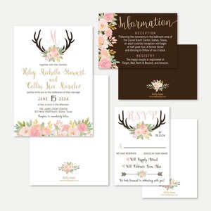 May include: Wedding invitation suite with a floral and antler design. The invitation features a pink and gold floral design with a gold antler monogram. The RSVP card features a pink and gold floral design with a gold antler design. The information card features a pink and gold floral design with a brown background.