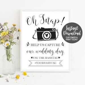 Oh Snap Help us capture on our wedding day, use the hashtag, with hashtag provided, photo of a camera, black and white colors, cute modern decor for wedding to add a social media touch, social media wedding, Supplies for wedding, wedding supplies