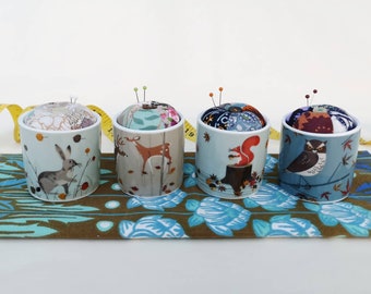 Pin cushions made in upcycled eggcups featuring woodland animals - deer, owl, hare or squirrel