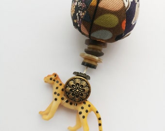 Cheetah decorandom - a pin cushion based hanging decoration made from upcycled materials