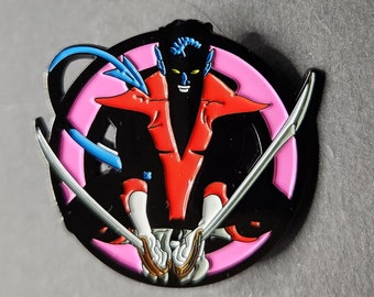 May include: A circular pin featuring a character design in black, pink, red, and blue. The character has blue hair, yellow eyes, and a red outfit. Two silver swords are crossed in front of the character, with a pink X behind.