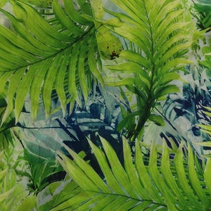 May include: A vibrant textile featuring a lush, tropical palm leaf design. The fabric showcases varying shades of green, creating a sense of depth and dimension. The leaves are detailed, with visible veins and textures, set against a light blue and white background.